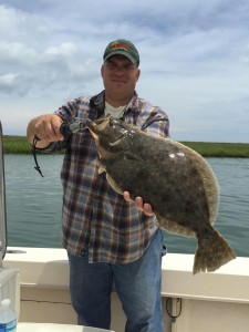 HERE IS A PIC OF A FLOUNDER CAUGHT WITH CAPT. KEVIN JOSENHANS. CAPT. KEVIN SHOWS HE CAN PUT YOU ON'EM ON BOTH BAYSIDE AND SEASIDE