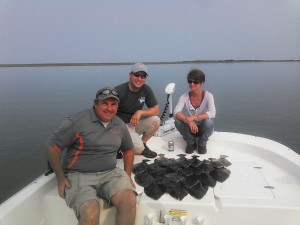 HERE IS A PIC OF SOME OF THE GOOD FOLKS AT TYSON FOODS ON A SEA HAWK CHARTER. THIS TRIP WAS A GREAT SUCCESS AND REMINDED US THE IMPORTANCE OF CLEAR WATER AND HOW THAT ONE FACTOR CAN MAKE OR BREAK A TRIP.