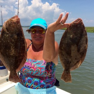 THE SEASIDE IS STILL PRODUCING FLOUNDER PARTICULARLY ON THE LAST OF THE FLOOD TIDE. TAKE PLENTY OF BAIT THE CRABS HAVE BEEN BAD.  MR. & MRS.  JEFF BEECH SOW THEIR SKILLS PULLING A COUPLE DOOR MATS OUT FROM THE MASSES OF UNDER SIZED FISH