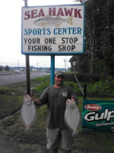 Here is a pic of Jeff with the 1st and 2nd place fish  from the Sea Hawk Flounder Tournament