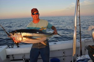Here is Capt. Tim with a nice yellowfin. Tims got the offshore bug for sure.